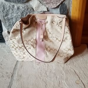 Tan and pink coach purse